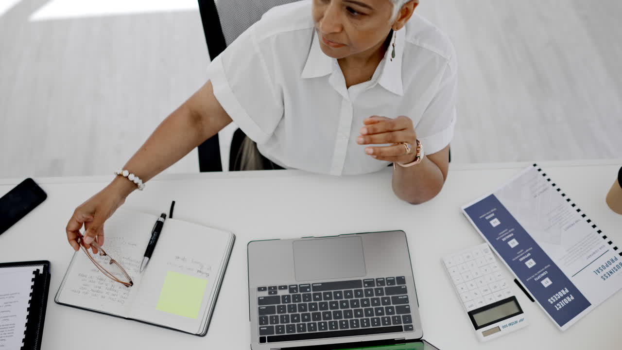 Top, desk and business woman with headache