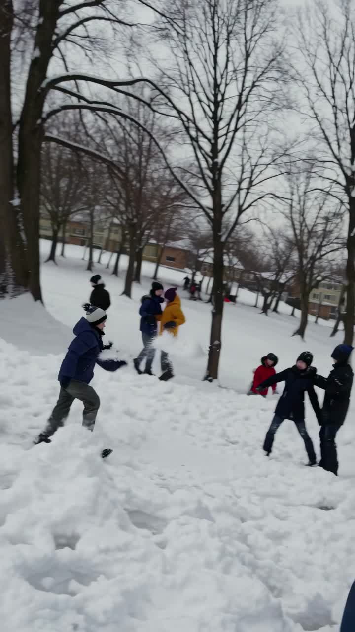 Close-up, candid shot of a joyful child in winter attire, captured from a side angle