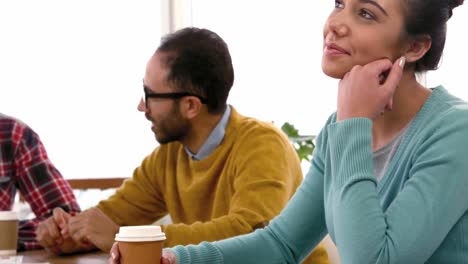 Casual-business-people-around-a-table