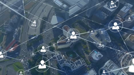 network of connections and data processing animation over aerial cityscape