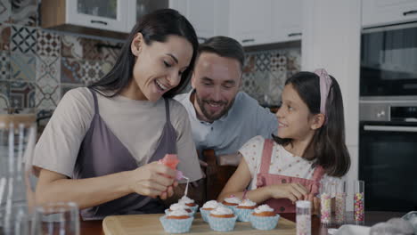 family baking cupcakes