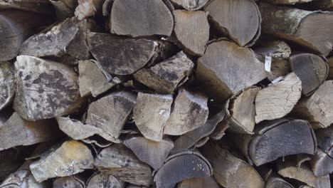 a close up of a pile of stacked firewood