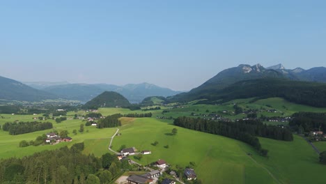 alpine valley with summer meadows that separates upper austria and salzburgerland.