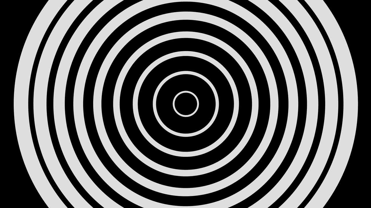 dibujo gráfico en blanco y negro con efecto estroboscópico e hipnótico, mientras gira en el sentido de las agujas del reloj y aumenta de tamaño.
