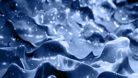 smooth animation of liquid black gradient in 4k. glossy paint surface as abstract looped stylish background. glitters in viscous liquid with 3d splashes on surface like drops. monochrome