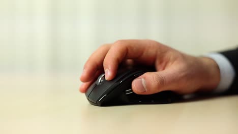 hand of man using mouse