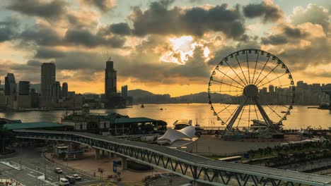 gran rueda de la hirsuta al amanecer en la ciudad de hong kong.