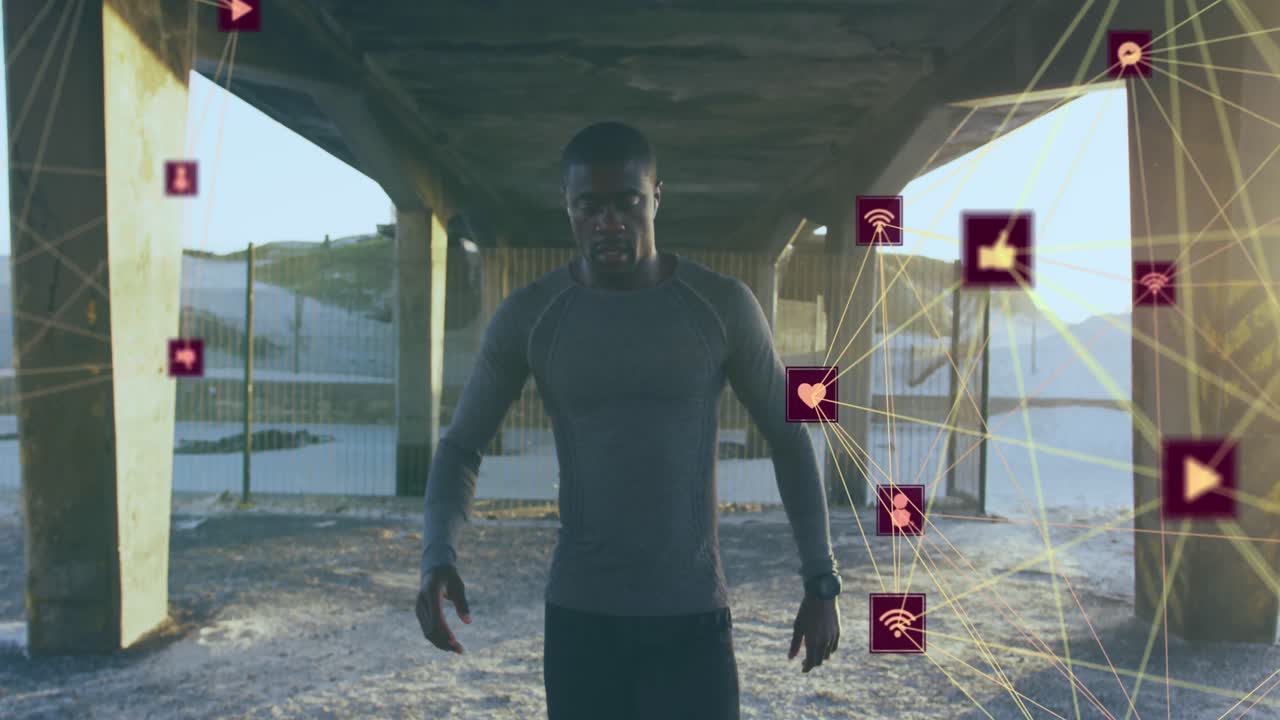 globos de iconos digitales girando contra el cansado hombre afroamericano en forma tomando un descanso de correr