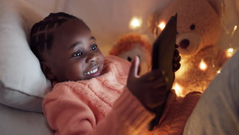 Girl,-tablet-and-child-in-bedroom-at-night-gaming