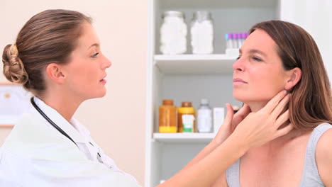 nurse examining a patient