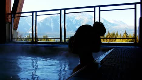 couple relaxing in swimming pool