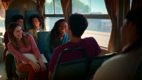 a diverse group of young adults laughing and enjoying a bus ride together