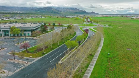 Beautiful-Scenic-Aerial-and-Establishing-shot-Over-Lake-Park-Boulevard-at-West-Valley-City-Utah-in-a-Cloudy-Day