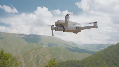 drone flying over mountains