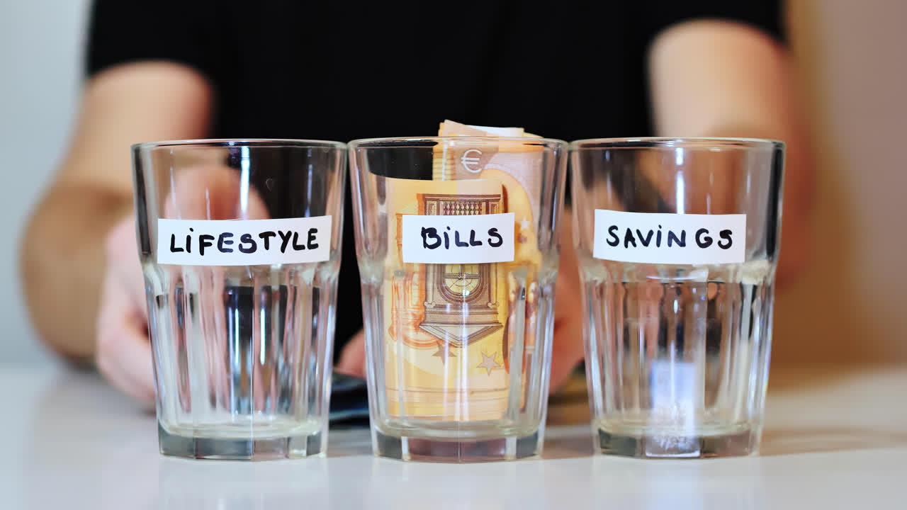 Static camera captures man paying bill in black shirt with moody bar atmosphere