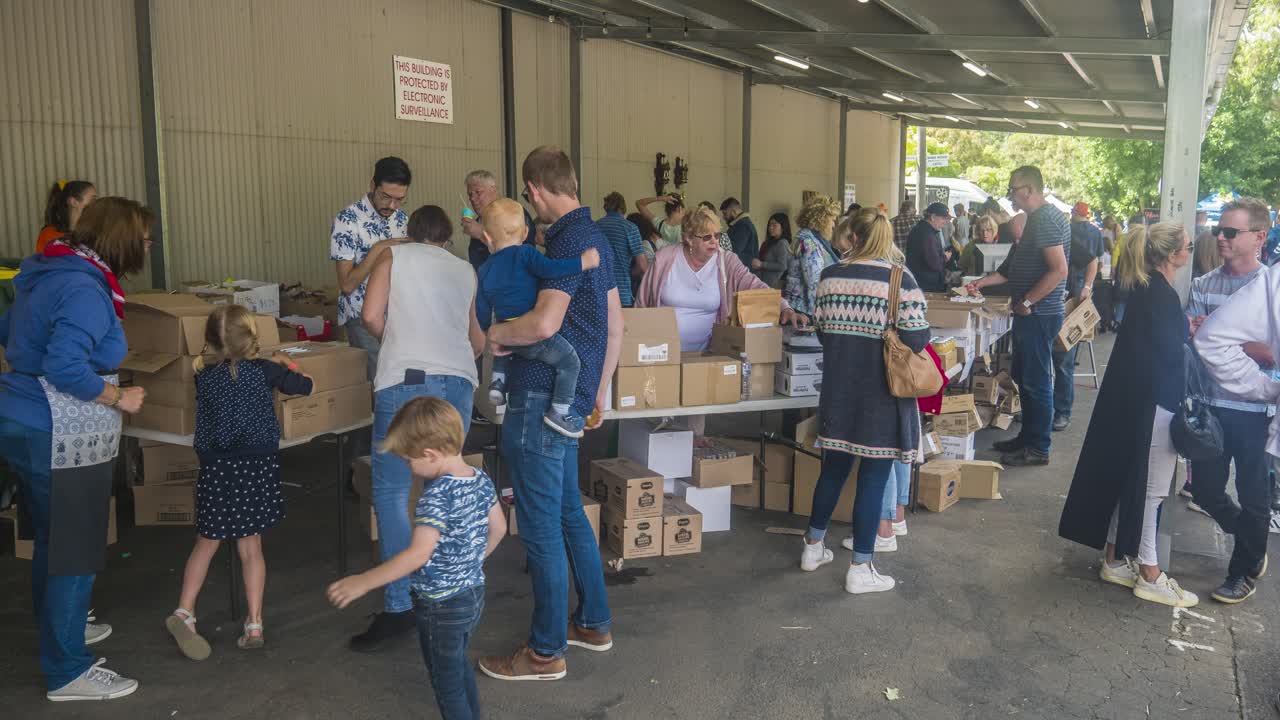 Timelapse of people buying Dutch food at the Holland Festival in the outer suburbs of Melbourne, Victoria, Australia, March 2020.