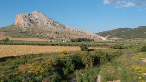 Flying-over-Andalusian-landscapes-over-the-Peña-de-los-enamorados-in-the-municipality-of-Antequera,-a-town-in-the-province-of-Malaga