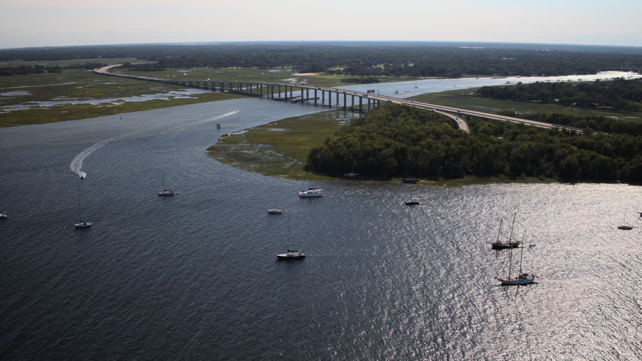Aerial Drone Shot Boats Traveling on the River near the Connector