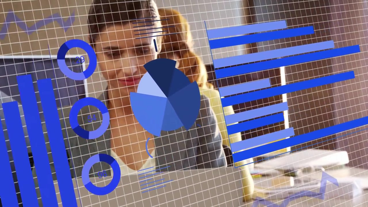 Seated woman typing, colleague leaning, blue animated charts shifting over laptop for business