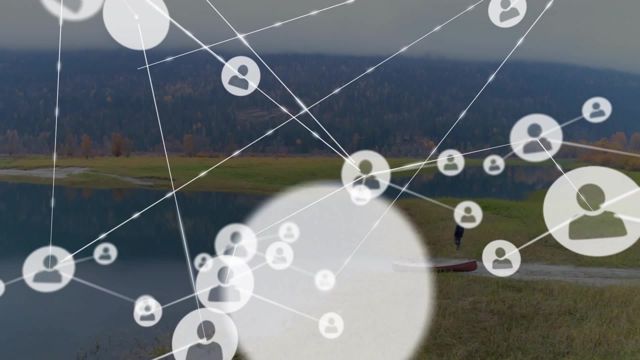 Man standing at boat shore, scene starting, nodes appearing, clustering near boat, overlaying data