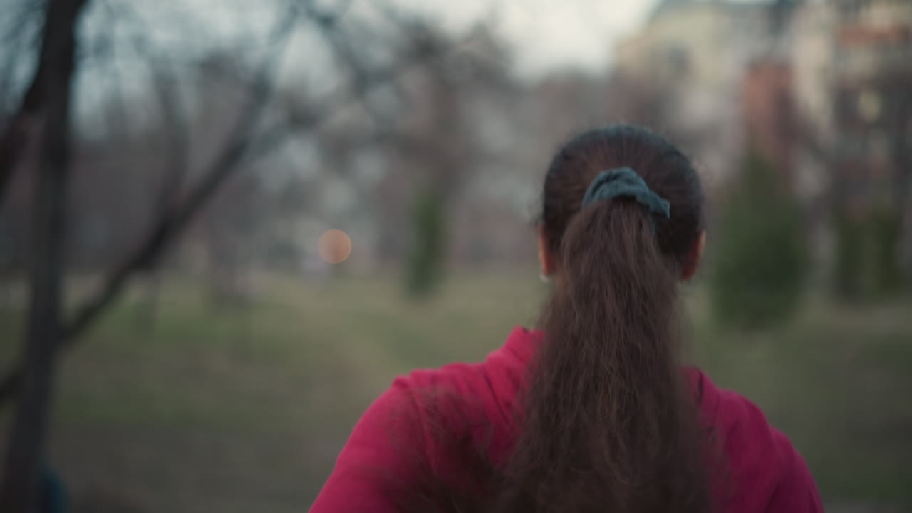 Woman Runs With Flowing Hair, Dynamic Woman Moves Swiftly With Hair Flying, Energetic Woman In Motion With Hair Streaming Through Park, Woman Actively Running In Park With Hair Flowing Wildly In Wind