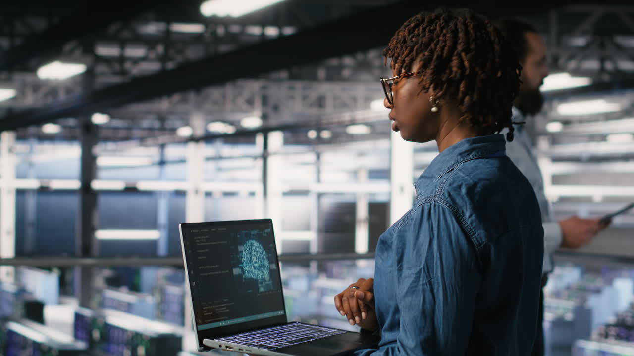 System administrators in data center monitoring AI LLM visualization