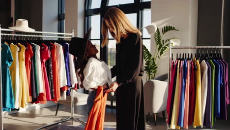 mother and daughter shopping for clothes