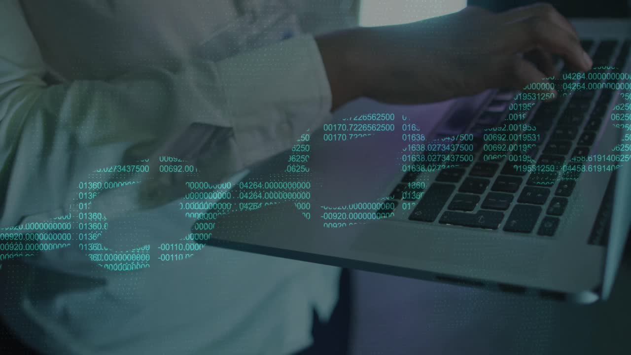 Animation of digital chain over african american man using laptop in server room