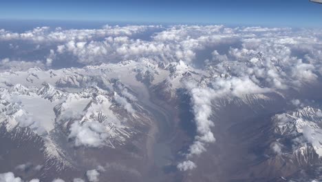 himalayas mountain range from an airplane. - pov