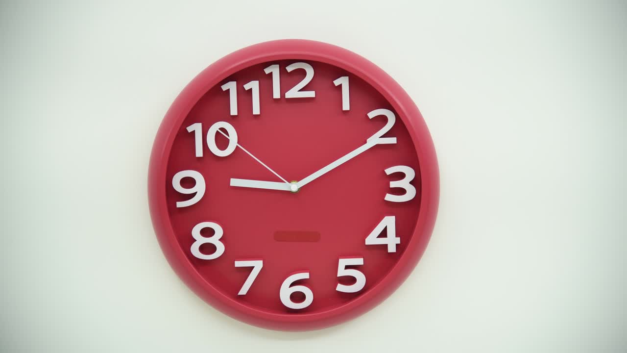 Single red clock on the wall