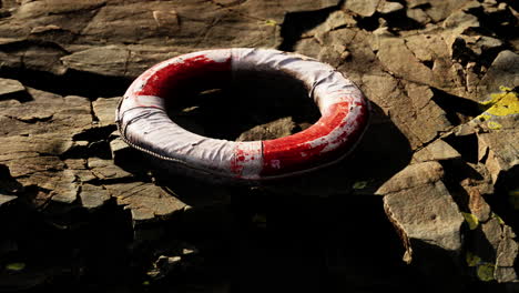 very old abandoned grungy lifebuoy