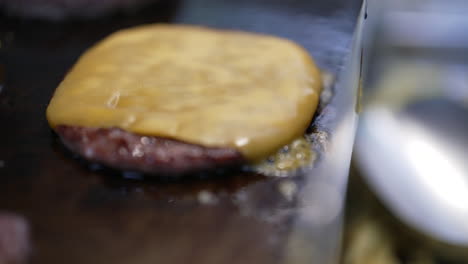 cooking a cheeseburger