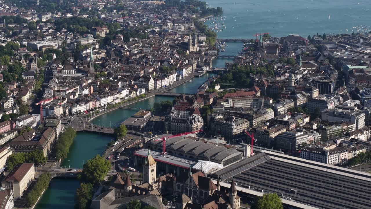 Aerial drone video of Zurich city views, Zurich Lake, cathedrals, skyline, and Limmat River