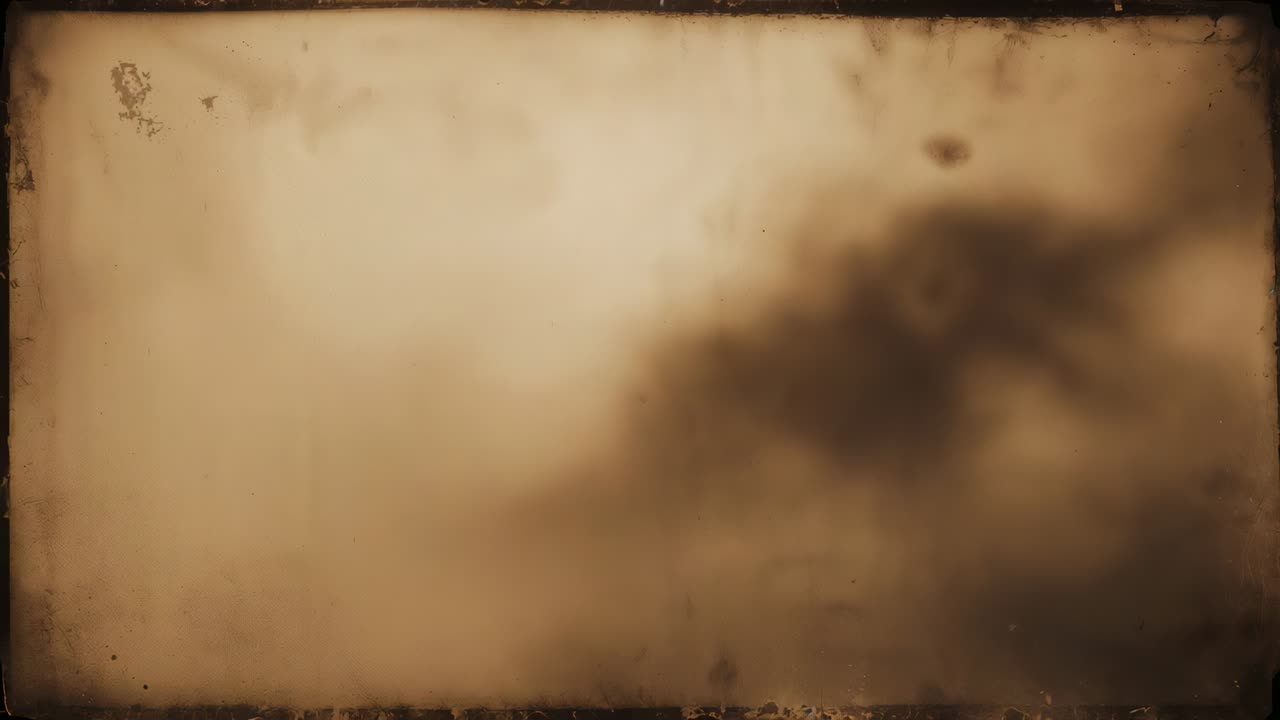 Expanding dark blotch growing at macro sepia frame, following falling droplet above, worn border