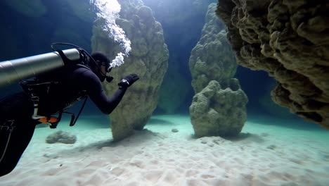 scuba diving in an underwater cave