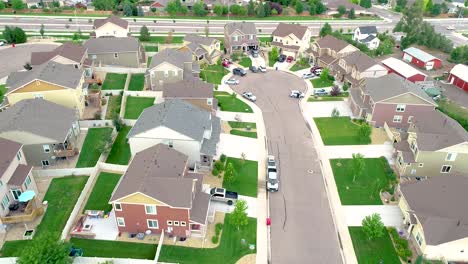 a drone flies over a middle class neighborhood