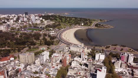 ramirez beach, montevideo city, uruguay. aerial backward