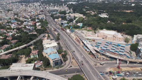 Aerial-footage-of-heavy-traffic-on-Central-Silk-Board-junction,-a-road-junction-in-Bangalore,-India