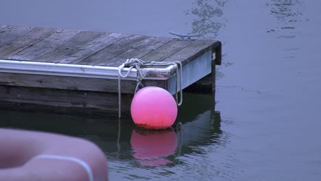 pier-with-buoy-attached---calm-waters