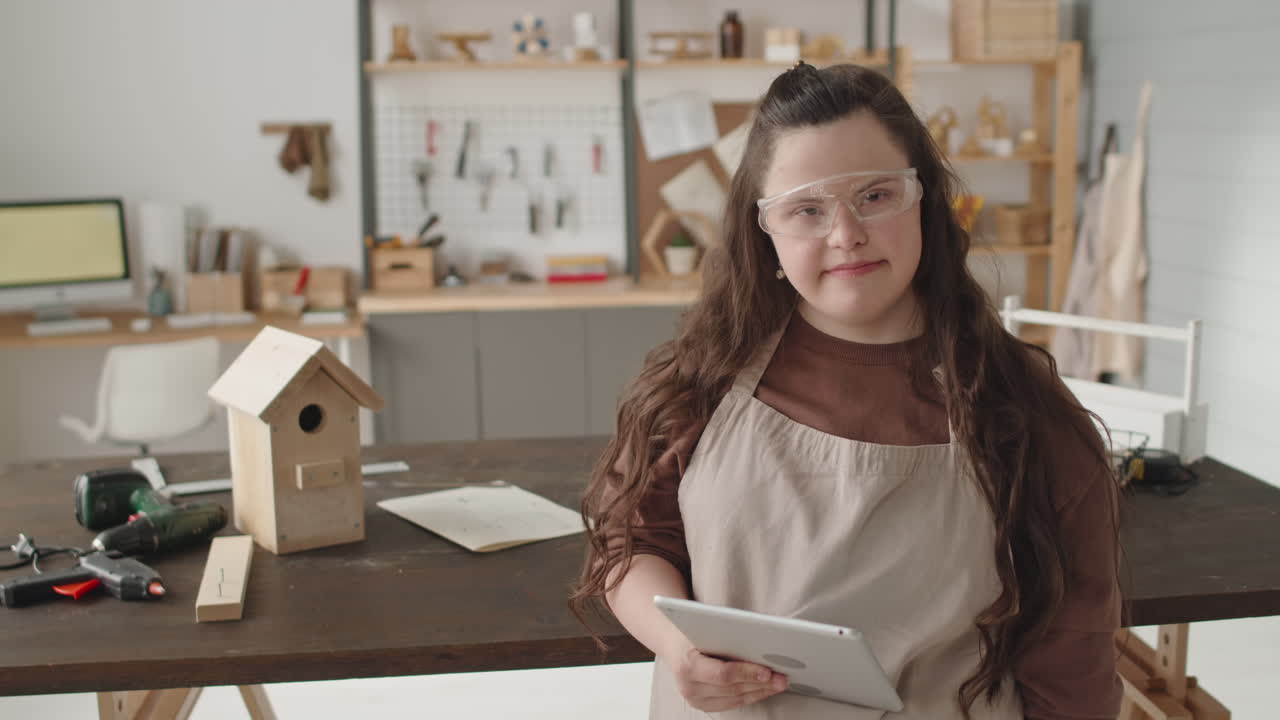Woman with Down Syndrome in Workshop