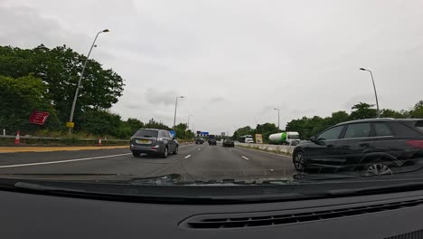 cars driving on a cloudy birmingham highway