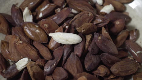 a closeup of galip nuts with their skin on