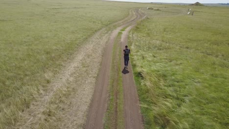 man running on a country road