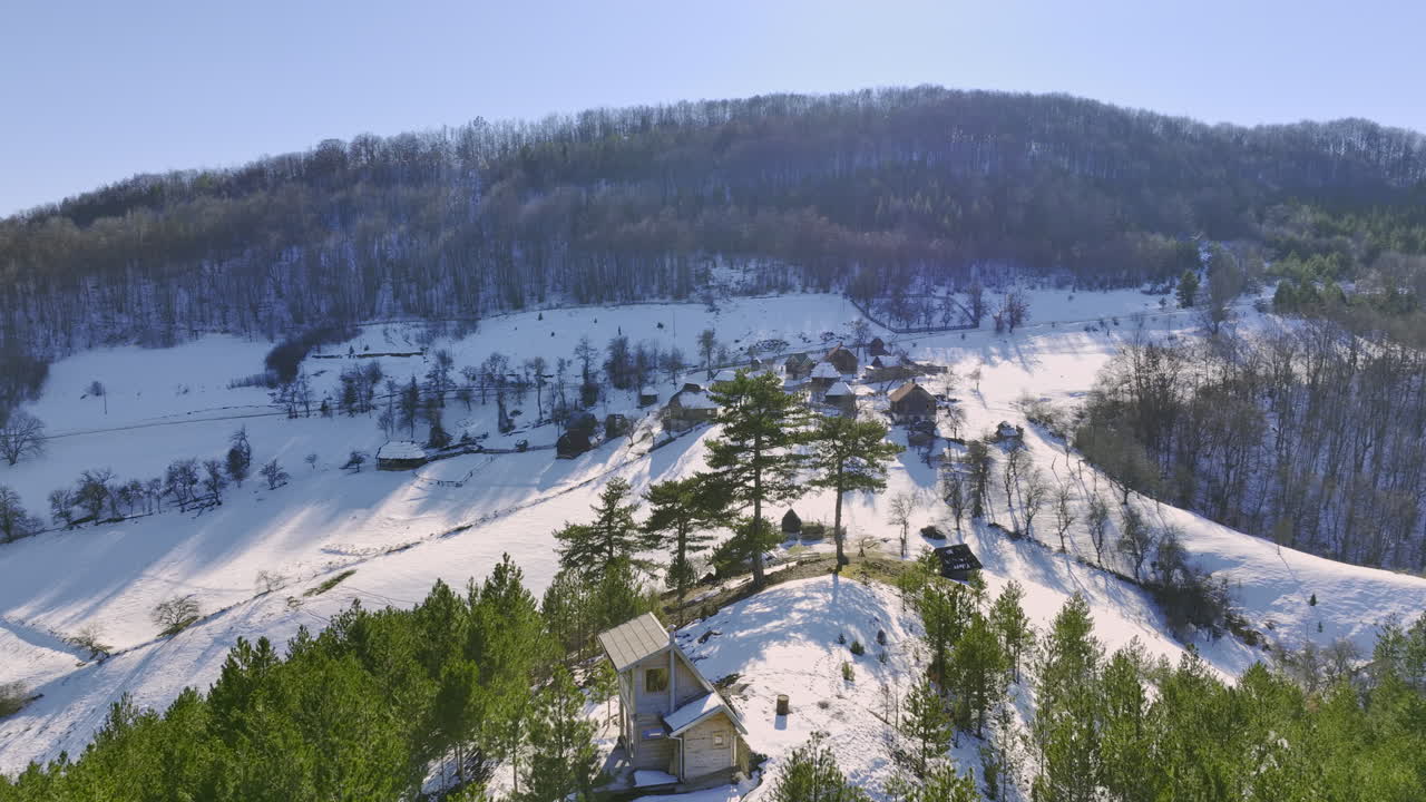 Aerial View of a Remote Snowy Mountain Village