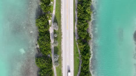 florida keys road with cars top down drone shot near miami