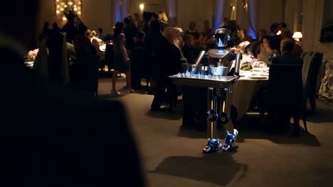 robot waiter at a formal dinner