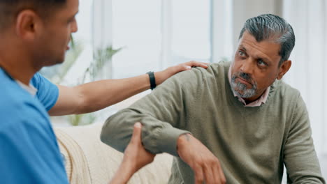 Man,-patient-and-physiotherapist-stretching-arm