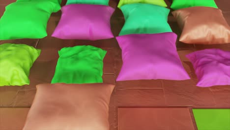 colorful pillows on a brick surface