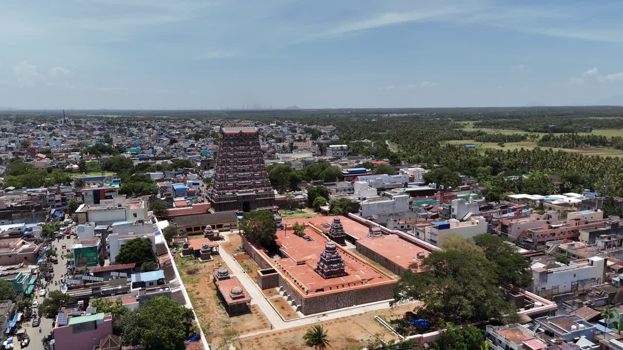 Aerial view of Tenkasi town, Tamil Nadu, showcasing the magnificent Kasi Viswanathar Temple with its towering gopuram surrounded by lush greenery and traditional town buildings