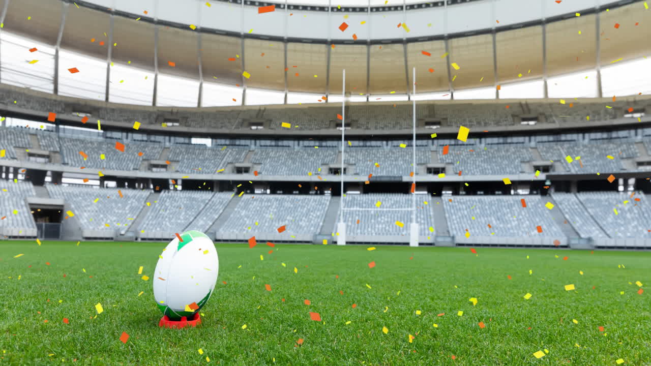 ⁇ 은색과 노란색의 콘페티가 떨어지는 스포츠 경기장